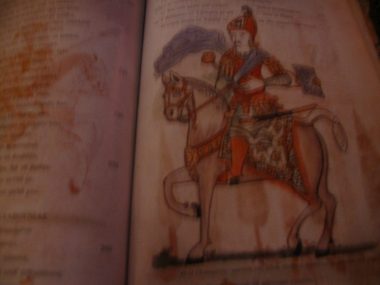 p.57r Glikaretos,lord of Axias (Naxos island) with a mace and a small shield at his hand.